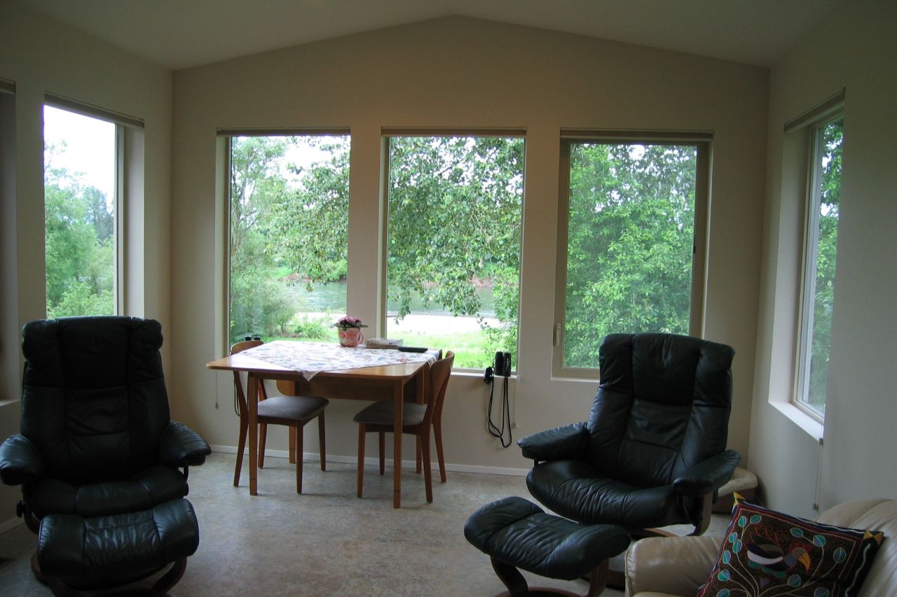 River-view family room addition by Powell Construction