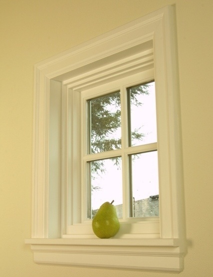 Trim detail showing elaborate window trim in this Cape Cod