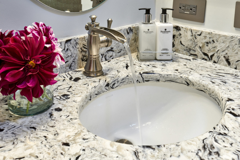 updated vanity with contemporary faucet Waterfall faucet on custom vanity in brushed nickel