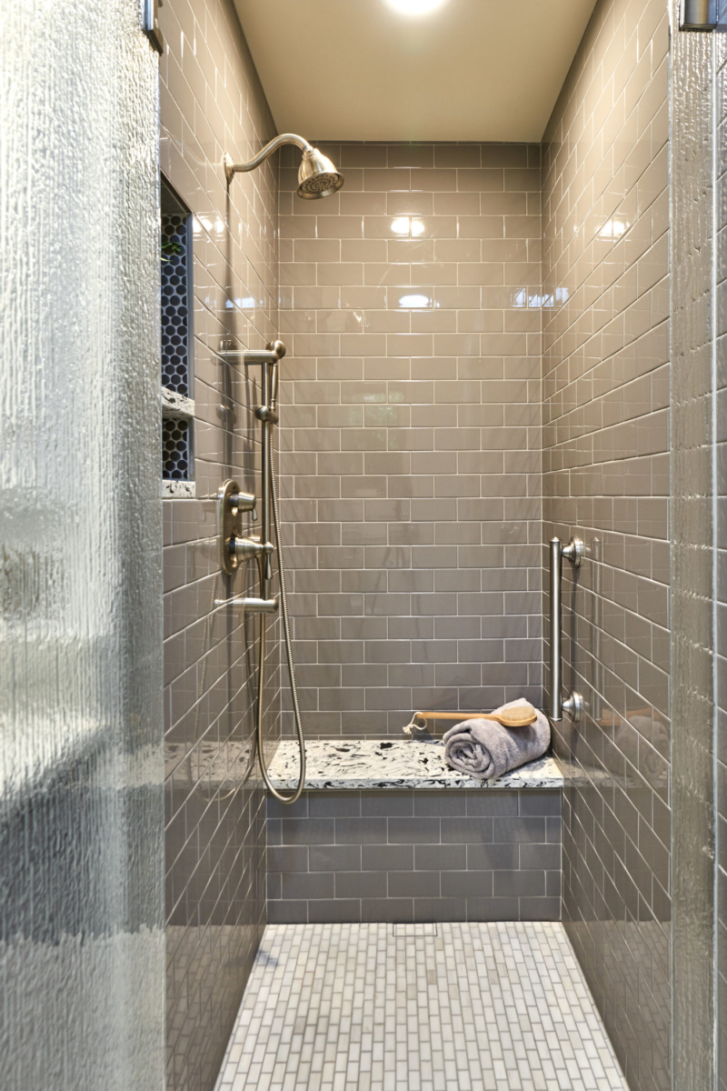 contemporary gray tile shower with updated plumbing fixtures gray tile shower with quartz bench for seating