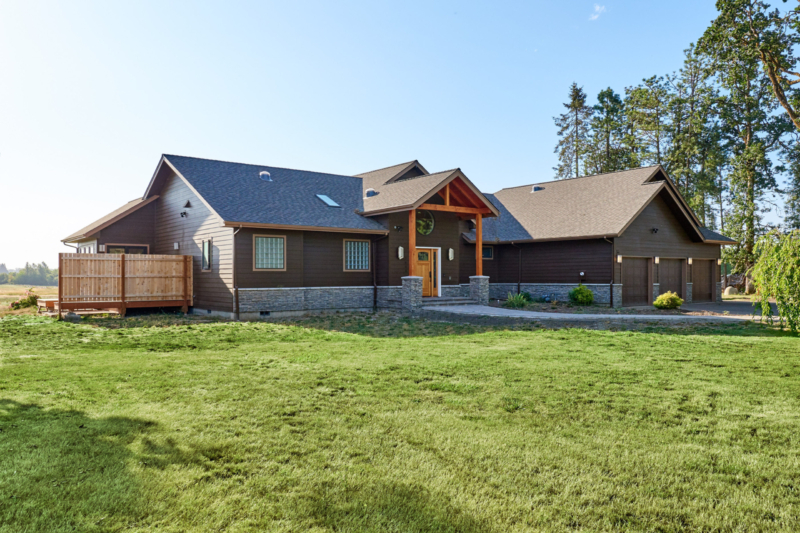 Exterior of home with timber beams on porch
