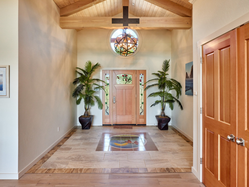 entry way with timber beams and tile flooring 