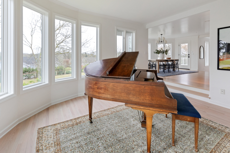 Beautiful grand piano with large windows