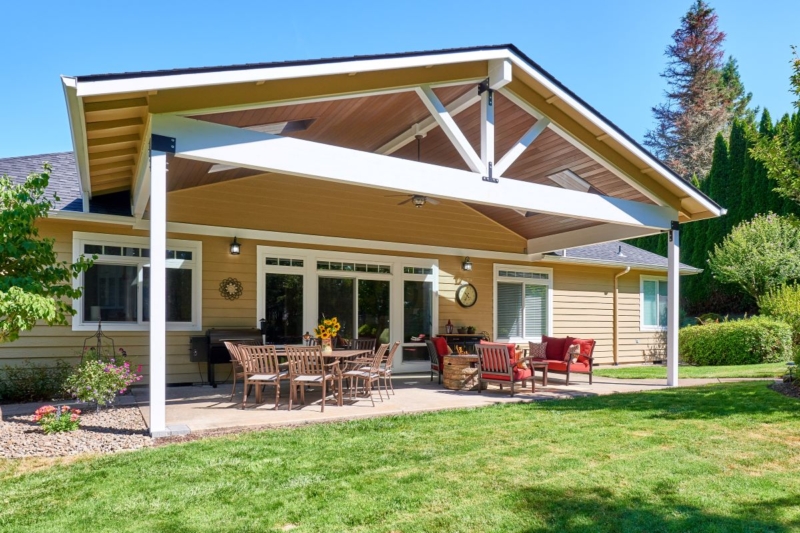 Covered patio off remodeled kitchen and dining area The home remodeling project included an outdoor living space.