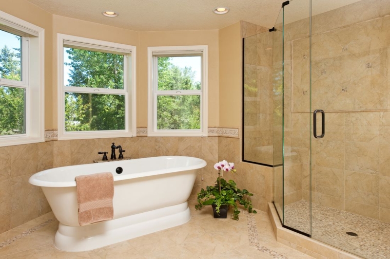 The master bath design specified a freestanding tub to visually enlarge the room. The master bath design specified a freestanding tub to visually enlarge the room.