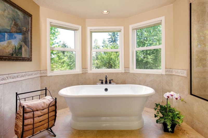 Roman, free-standing tub is an elegant focal point in this bathroom. Our designers specified a freestanding roman tub to visually enlarge the room.