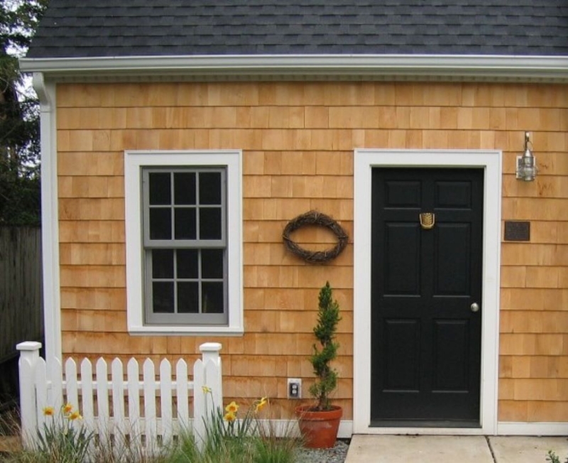 Alaskan yellow cedar siding on a Cape Cod garage Alaskan yellow cedar siding on a Cape Cod garage