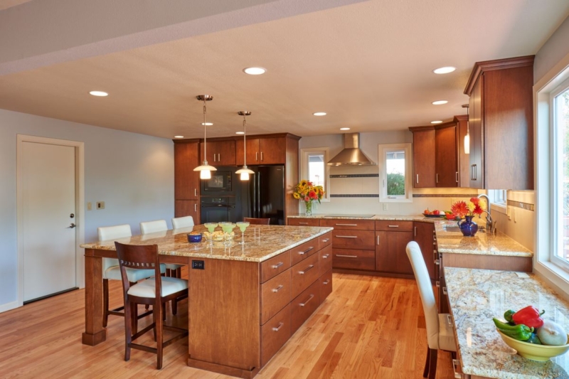 Remodeled kitchen expansion into living space This kitchen expansion in Corvallis removed a center wall, creating an open feeling.