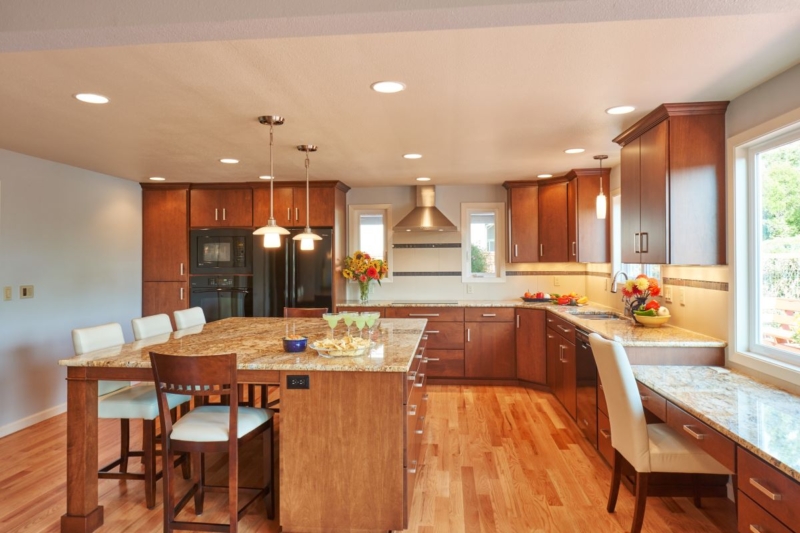 Custom cabinets in kitchen remodel This kitchen renovation created an open, spacious feeling without additional square footage..