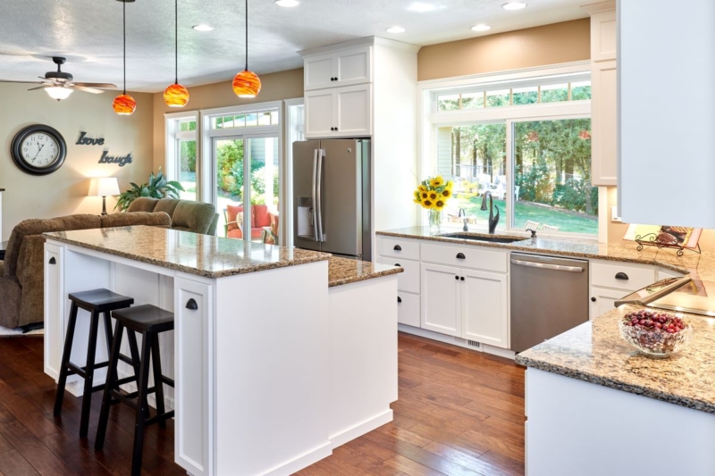 Full kitchen remodel The kitchen design located the refrigerator where it is easily accessible from outside.