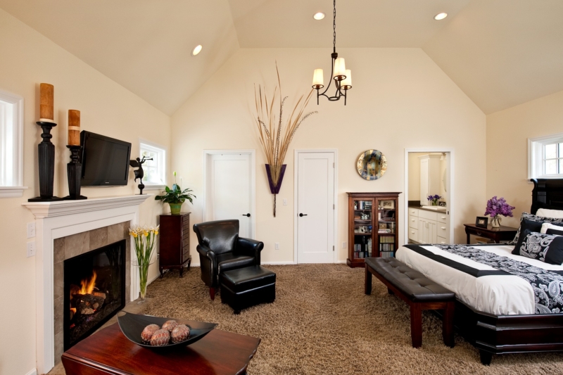 Cape Cod addition and kitchen by Powell Construction Bedroom with wide layout and natural light