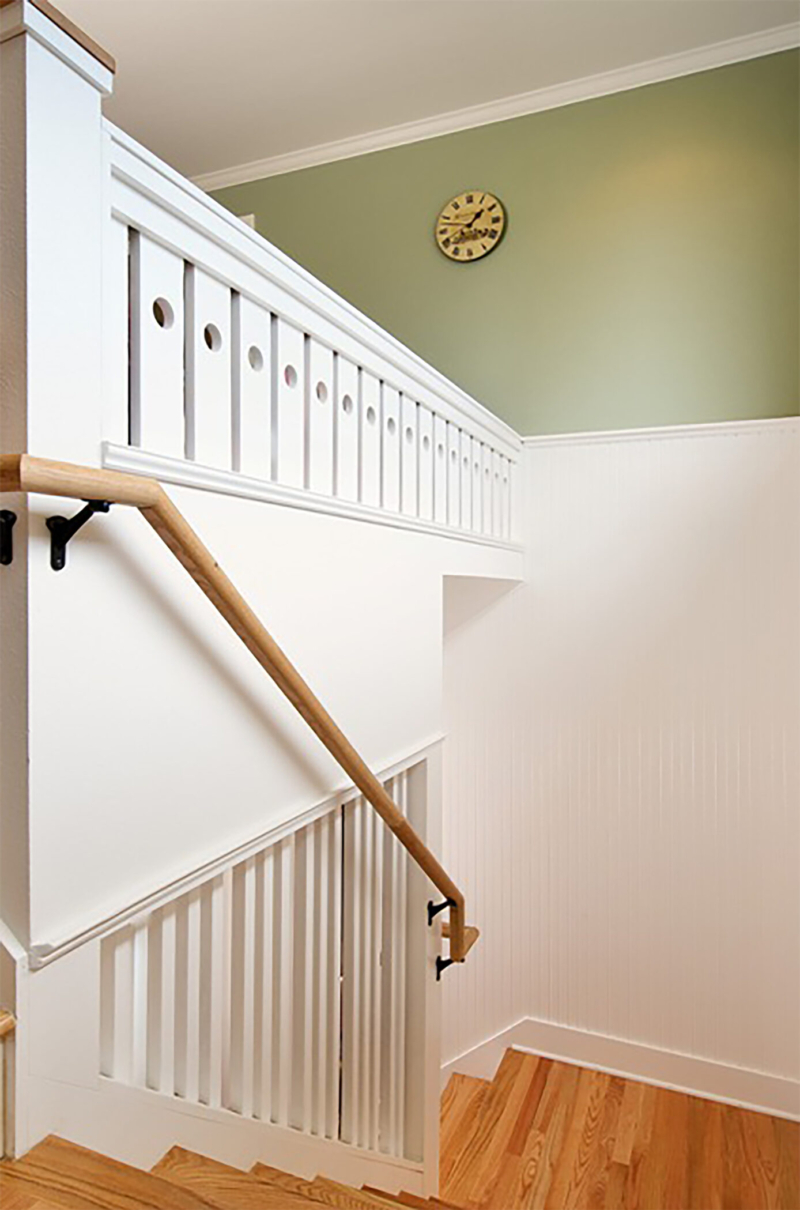 Custom built stairs all in white with dye cut pickets. Custom built stairs all in white with dye cut pickets.