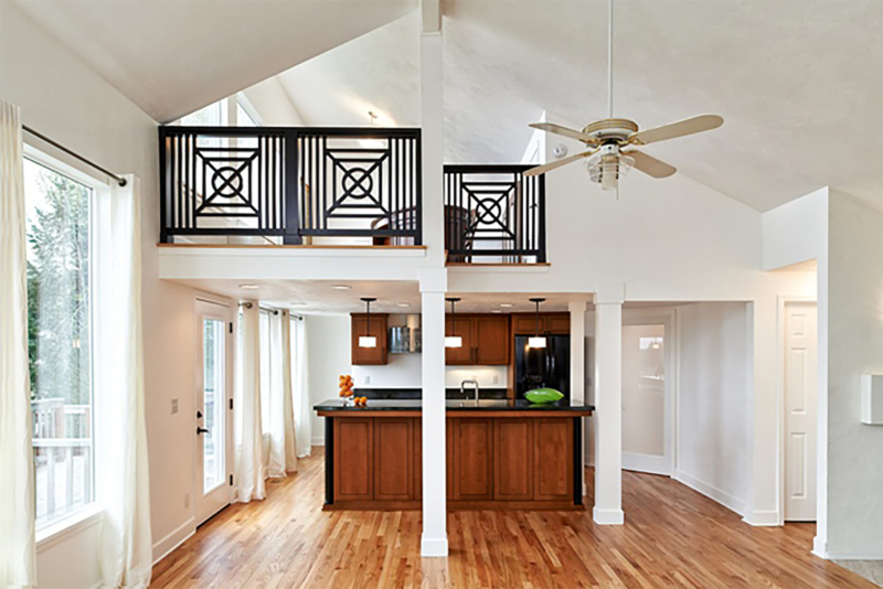 Kitchen with home office loft above in contemporary, vaulted space. Kitchen with home office loft above in contemporary, vaulted space.