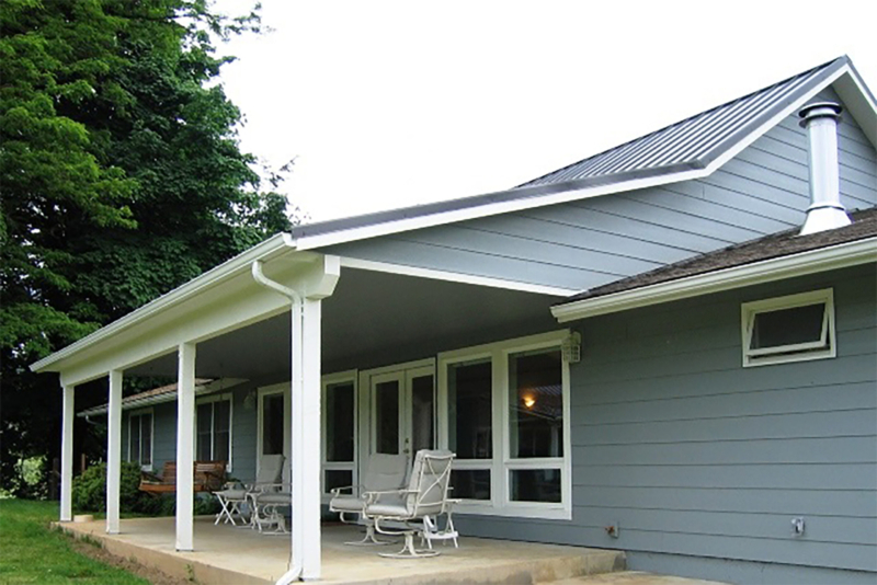 A new porch cover was built over a patio. A new porch cover was built over a patio.