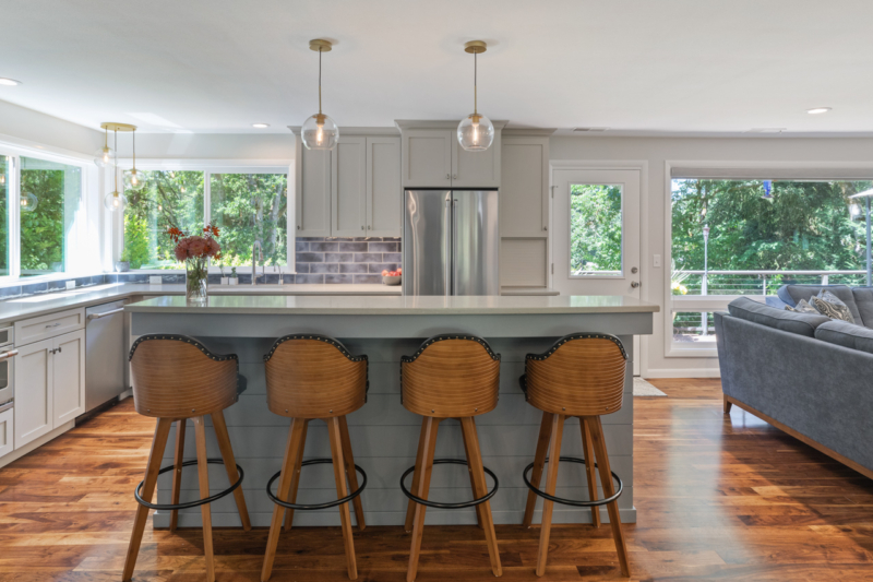 Light grey island with plenty of room for seating Light grey island with plenty of room for seating