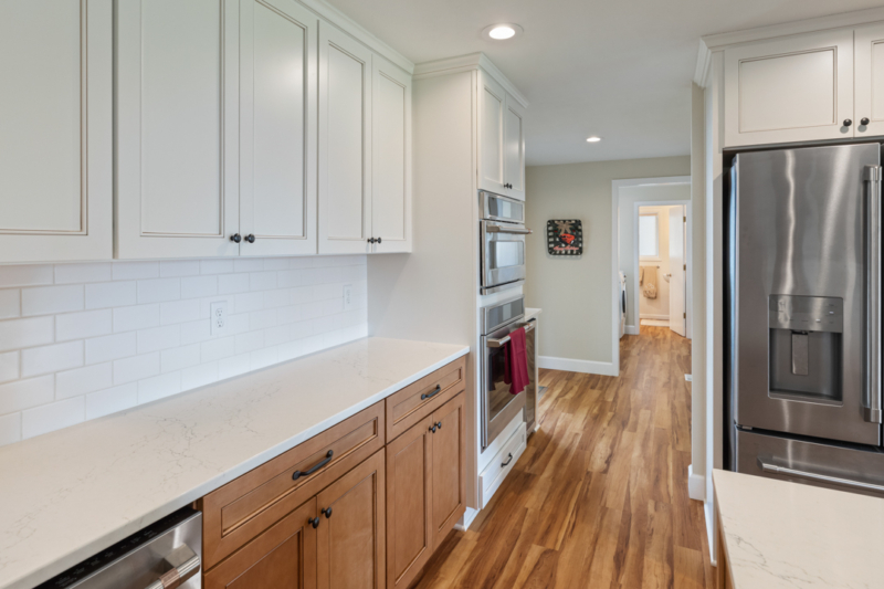 Rich, warm flooring is a CoreTEC product called "Red River Hickory"