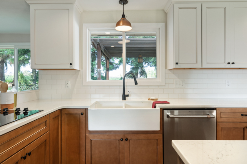 Copper pendant over large apron sink.