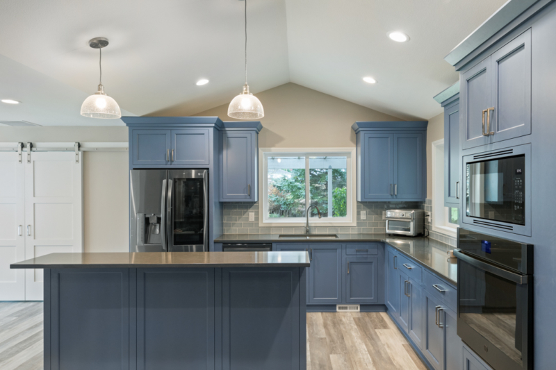 Full view of charcoal blue kitchen Full view of charcoal blue kitchen remodel by Powell Construction.