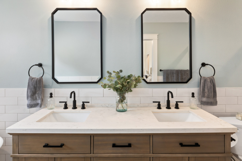 Double vanity with black matte finishes in ensuite bathroom addition Beautiful, modern farmhouse ensuite bathroom with black matte fixtures