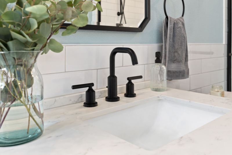 Black Faucet-black mirror-pirmary ensuite addition-Powell Construction-Corvallis OR Black Fixtures provide accent to serene tones in primary bath