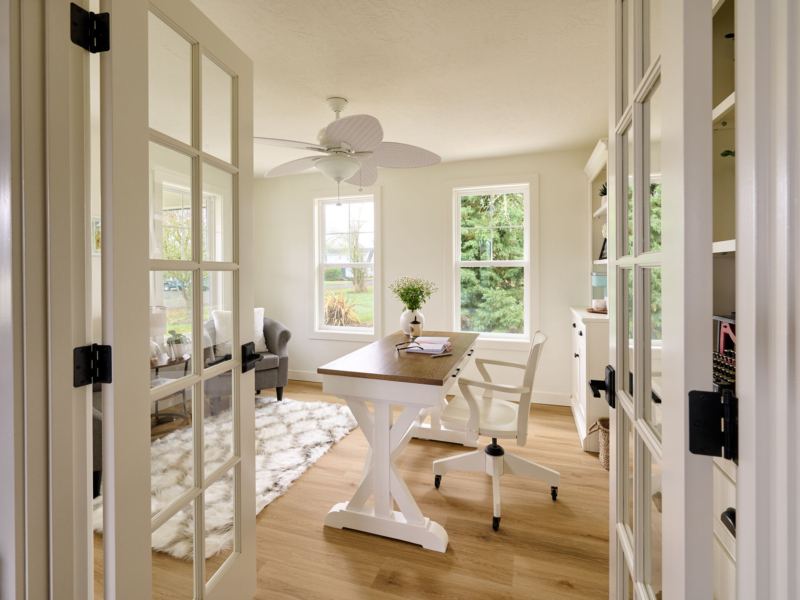 French doors connecting entryway to home office space. Corvallis Home Office remodel by Powell Construction