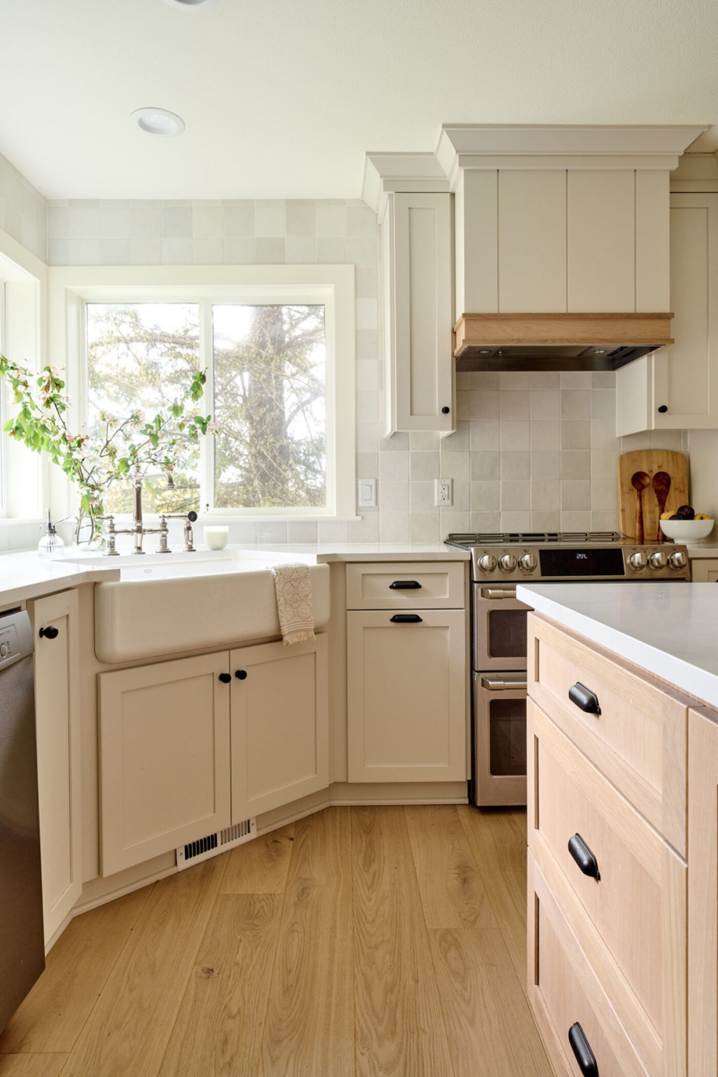 Lots of light pours in this corner sink window. Newly remodeled kitchen has lots of natural light, by Powell Construction in Corvallis OR