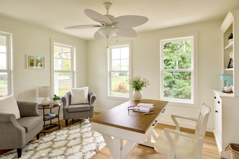 Plenty of windows bring bright, natural light into this home office. New Windows add natural light to this home office by Powell Construction of Corvallis