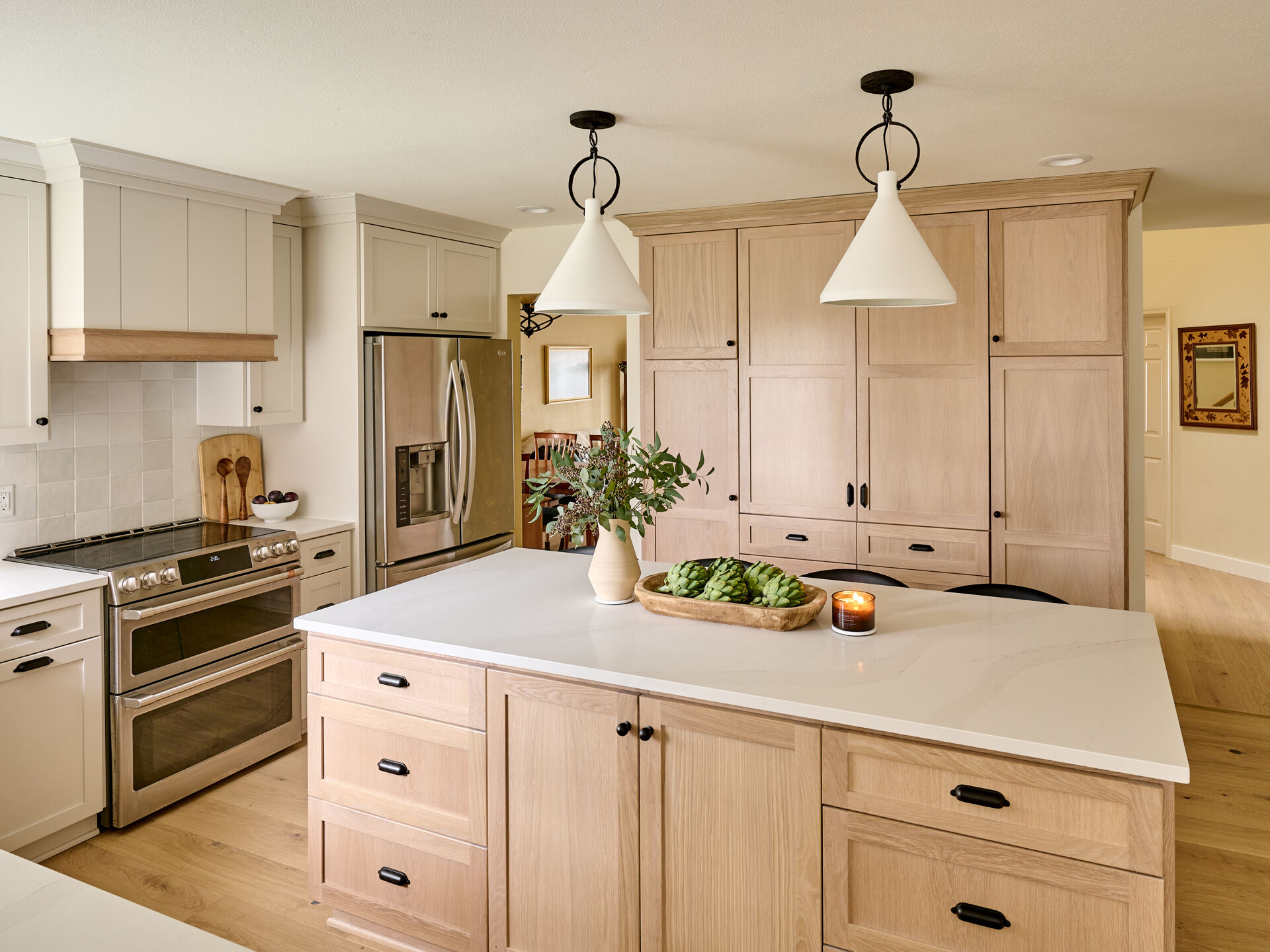 Large island with ample seating, counterspace and storage in Kitchen remodel by Powell Construction