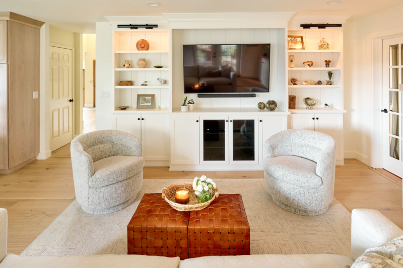 Built in entertainment center and display cabinetry in remodel by Powell Construction