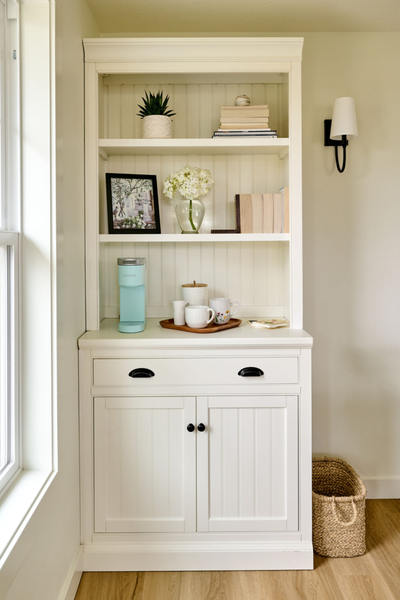 Charming built-in bookcase is a handy spot for a coffee corner. Built in bookcase