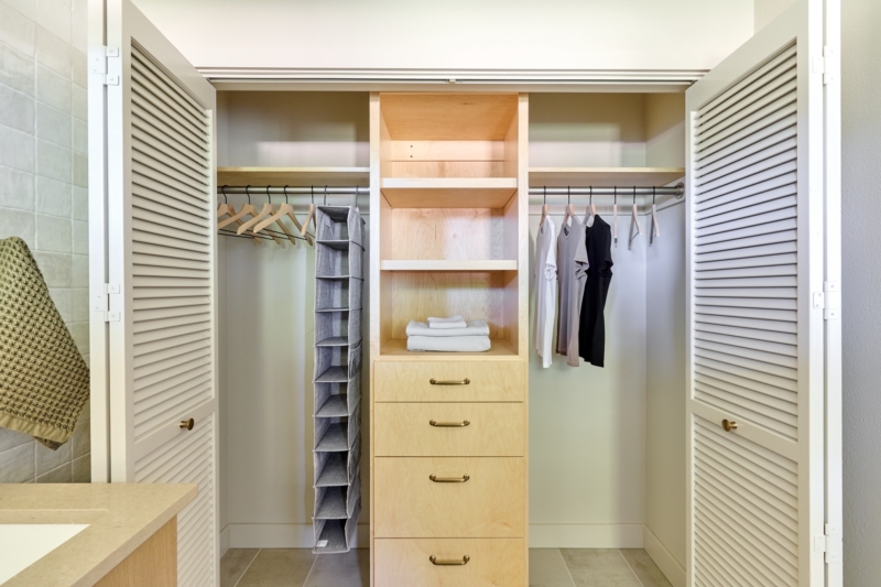 Closet organizer in guest suite Closet organizer in guest suite of whole home remodel by Powell Construction