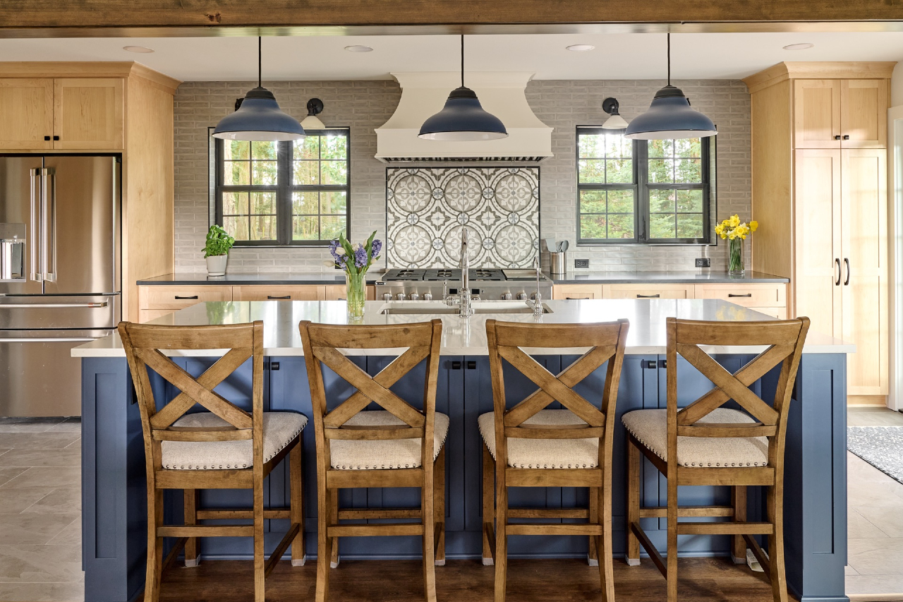 Four person island with statement pendants above.