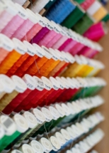 Custom made thread rack with colorful spools of thread