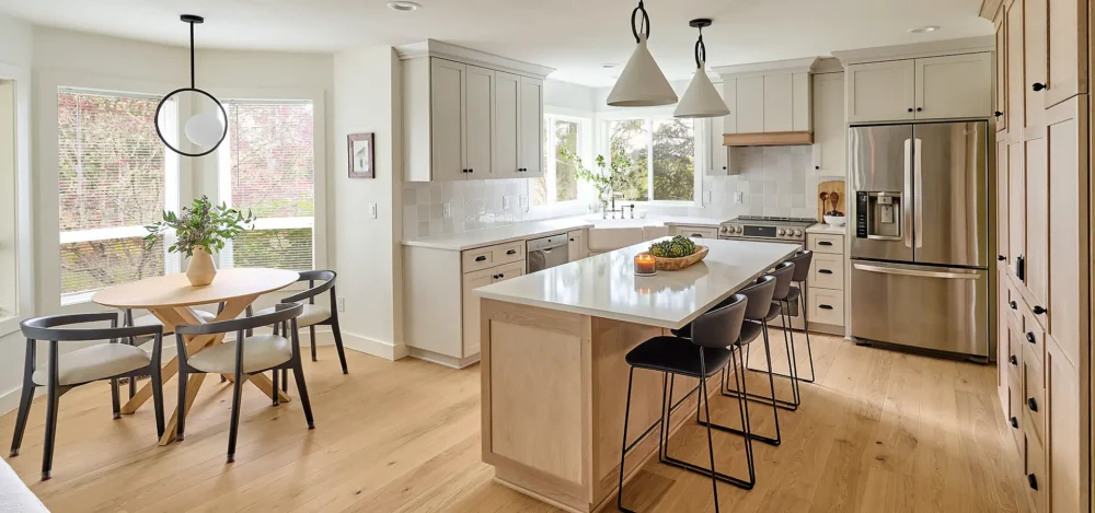 Classic naturals kitchen with island, custom cabinetry and fixtures