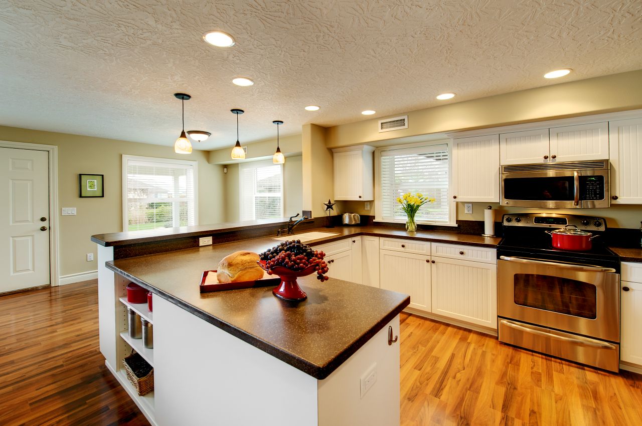 Guest suite basement remodel, including full kitchen by Powell Construction,