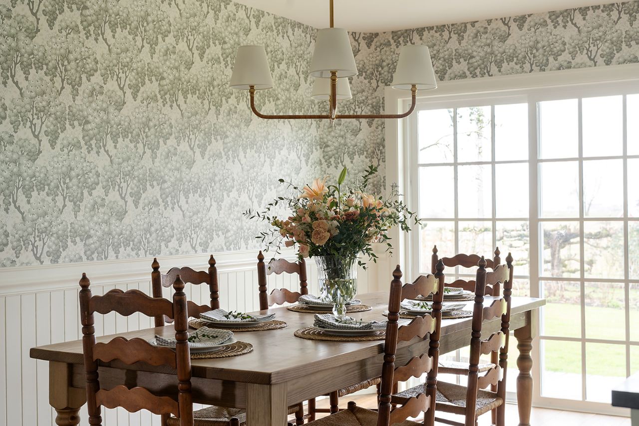 Spring Centerpiece of soft florals tops the dining table of this remodel by Powell Construction.