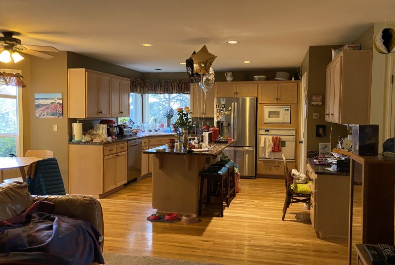 Kitchen, dark and outdated prior to remodel by Powell Construction