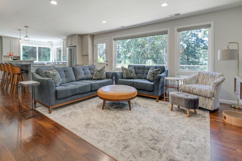 Photo of a beautifully coordinated, remodeled kitchen and living space, by Powell Construction.