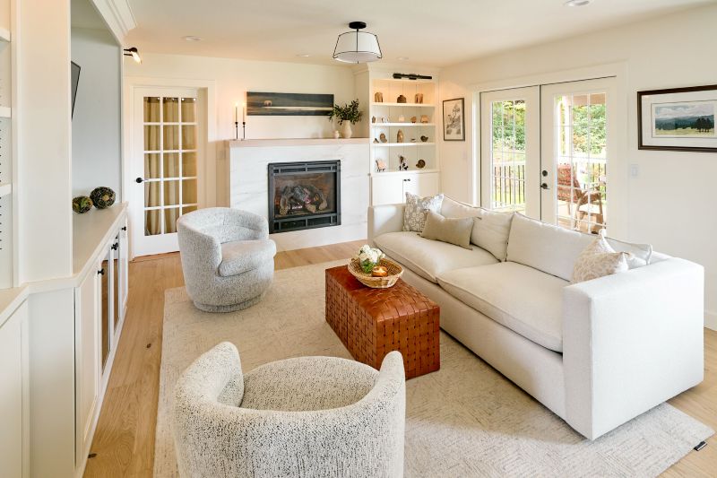 Bright and refreshed, this formerly dated space is now a perfect complement to the adjacent kitchen.