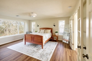 Primary suite addition with large picture windows by Powell Construction of Corvallis OR