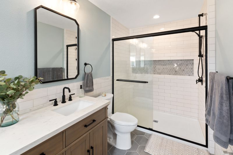 Spacious walk-in shower with hexagon tile detail tile in the long horizontal niche.