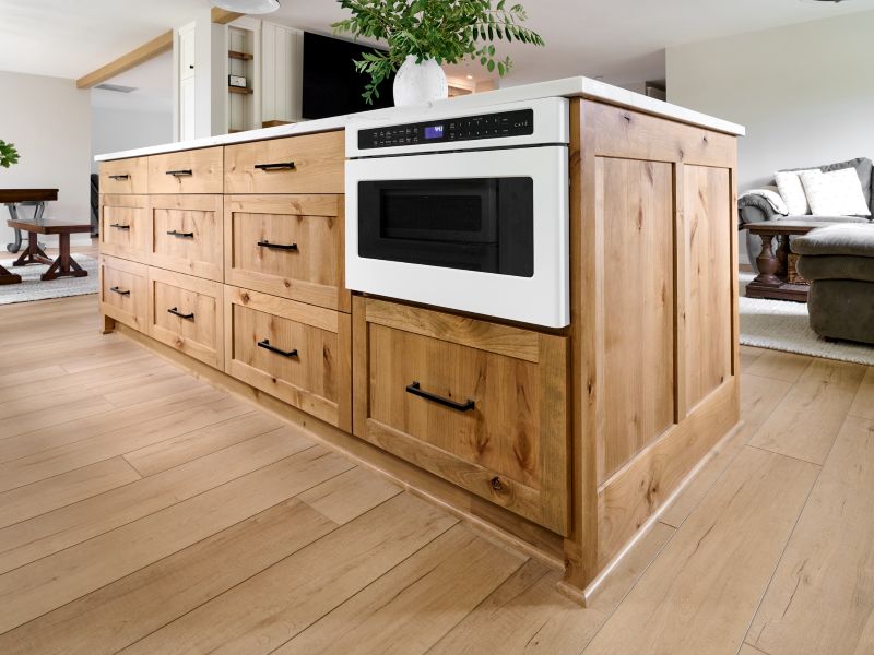 A microwave drawer is built-in to the kitchen's island freeing up space on the perimeter of the kitchen.