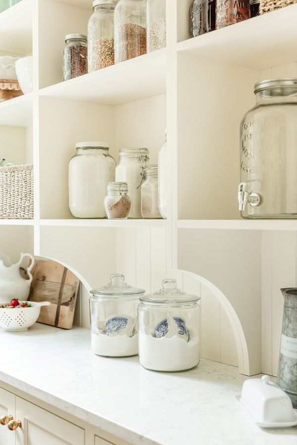 Corbel-detail A custom corbel adds cottage style detailing to open pantry shelving