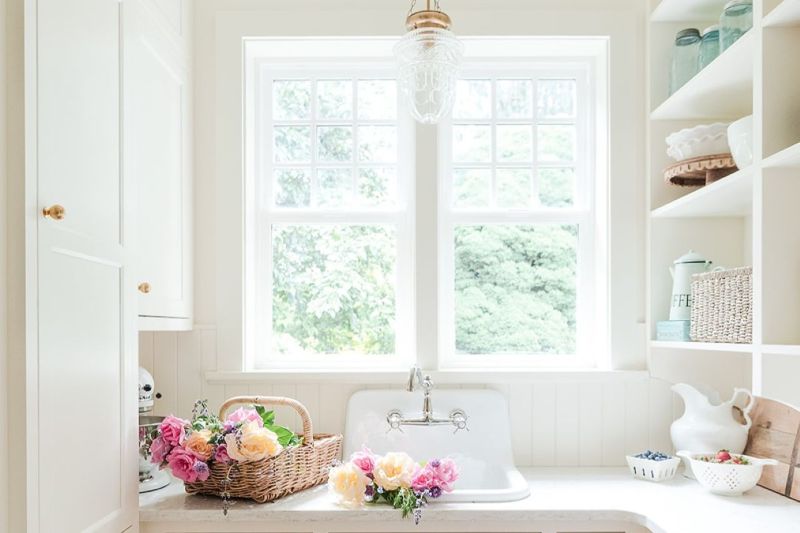 Farmstyle-sink-header Farm style sink in from of large window overlooking the garden.