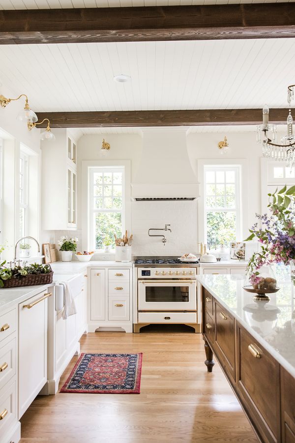 Wide kitchen aisle creates easy movement while cooking and cleaning is underway