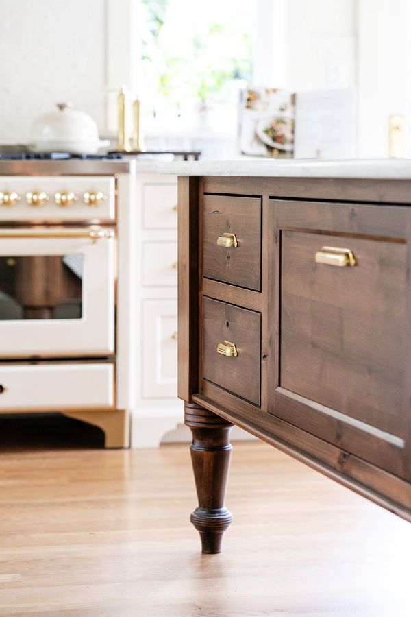 Brass cup pulls on kitchen island