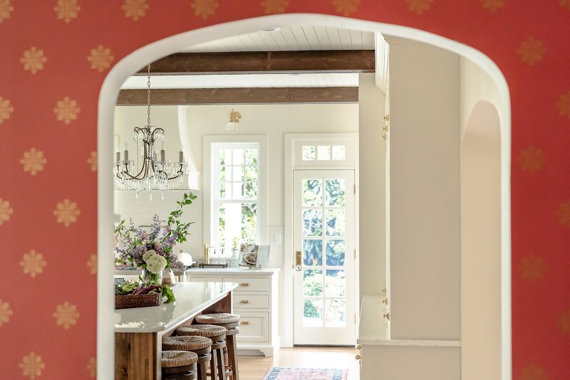 Arched opening from the dining room into to the kitchen