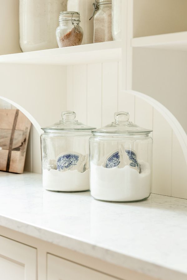 Wainscotting-detail Wainscoting detail behind open shelves adds to the cottage flair