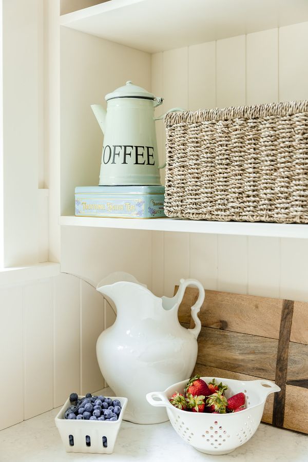 Window-corner Detail shot of vases, cutting boards and fresh fruit in the corner of a butlers pantry