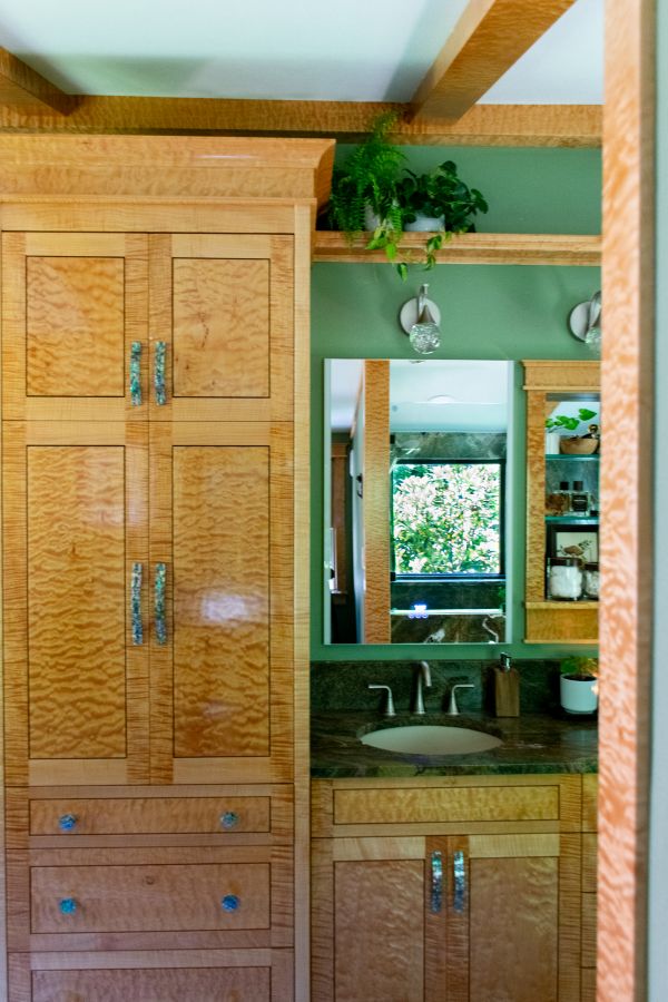 Curly maple bathroom cabinetry